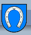 Das Logo von Michelbach mit Link zur Startseite der Gemeinde. Es zeigt ein nach unten geffnetes Hufeisen auf blauem Grund.